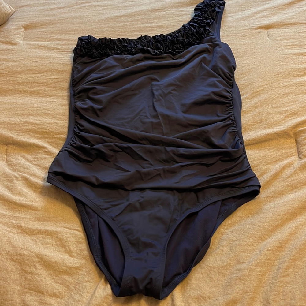 Kenneth Cole one piece. One of my favorite suits ever. Just too small now.